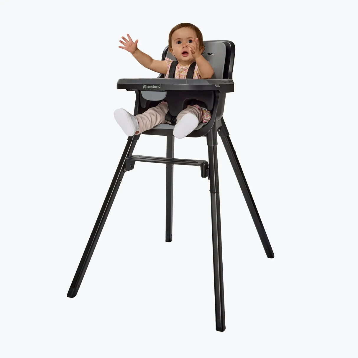 A child sitting in the Baby Trend Sweet Seat 4-in-1 High Chair