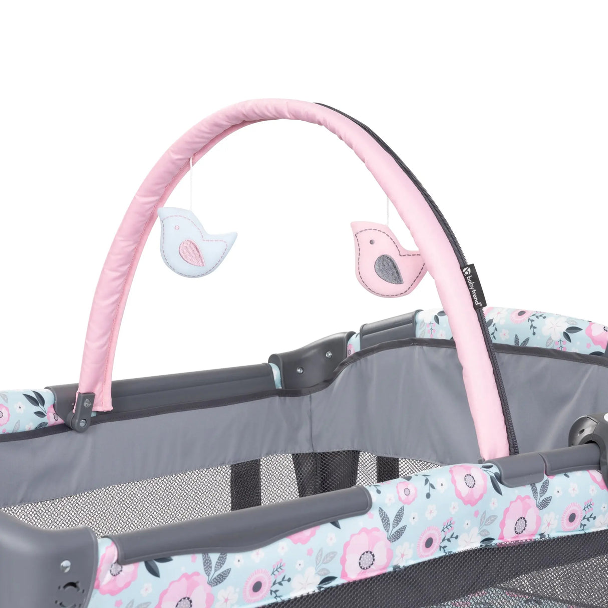The toy bar on the Baby Trend Deluxe II Nursery Center Playard with two hanging toys