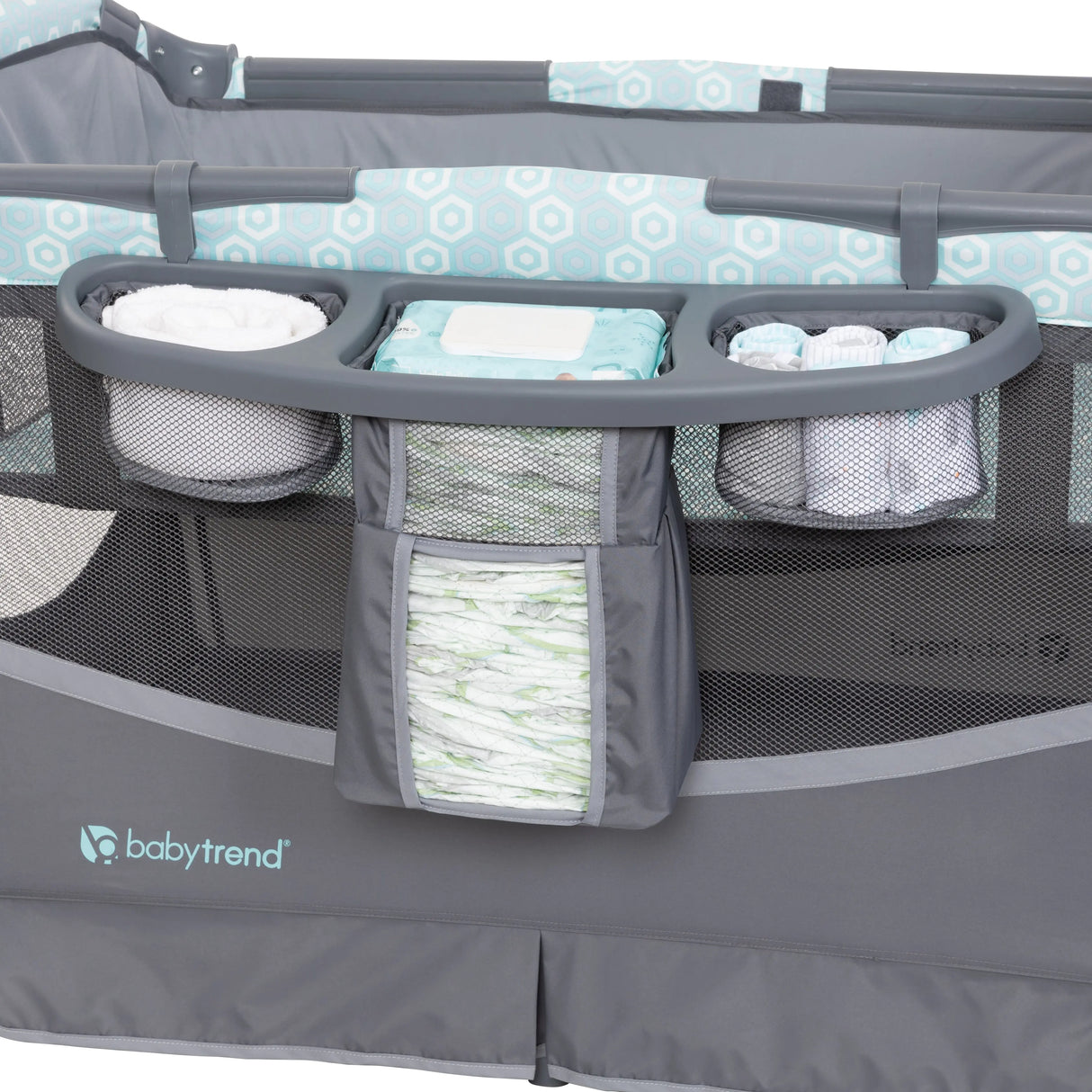 The parent diaper organizer on the side of the Baby Trend EZ Rest Deluxe Nursery Center