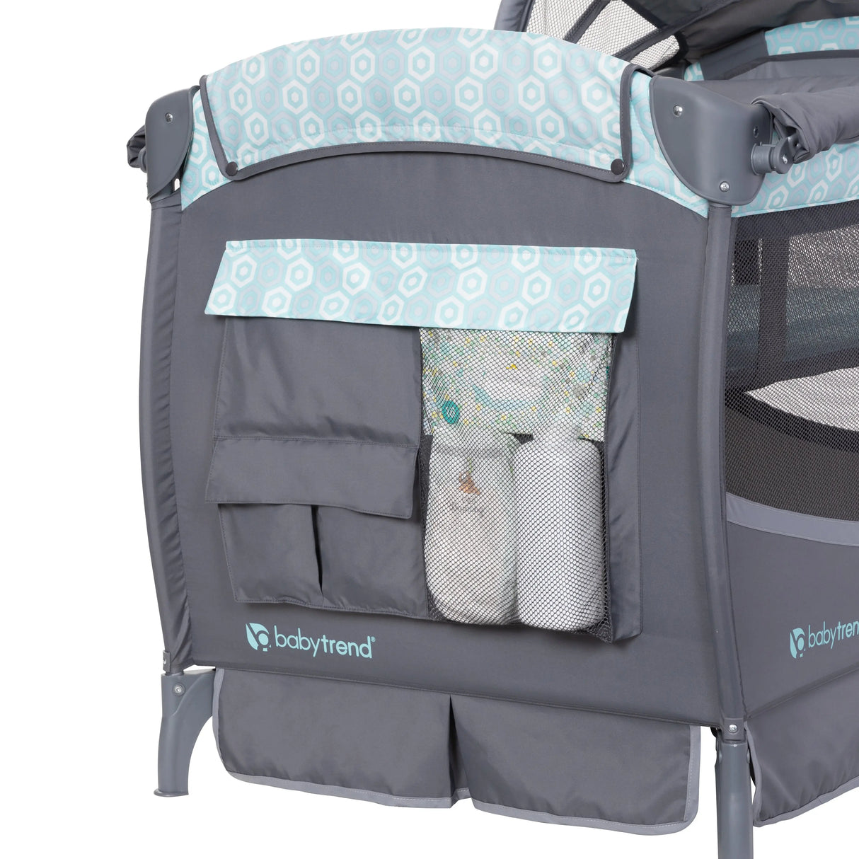The side storage compartments on the Baby Trend EZ Rest Deluxe Nursery Center