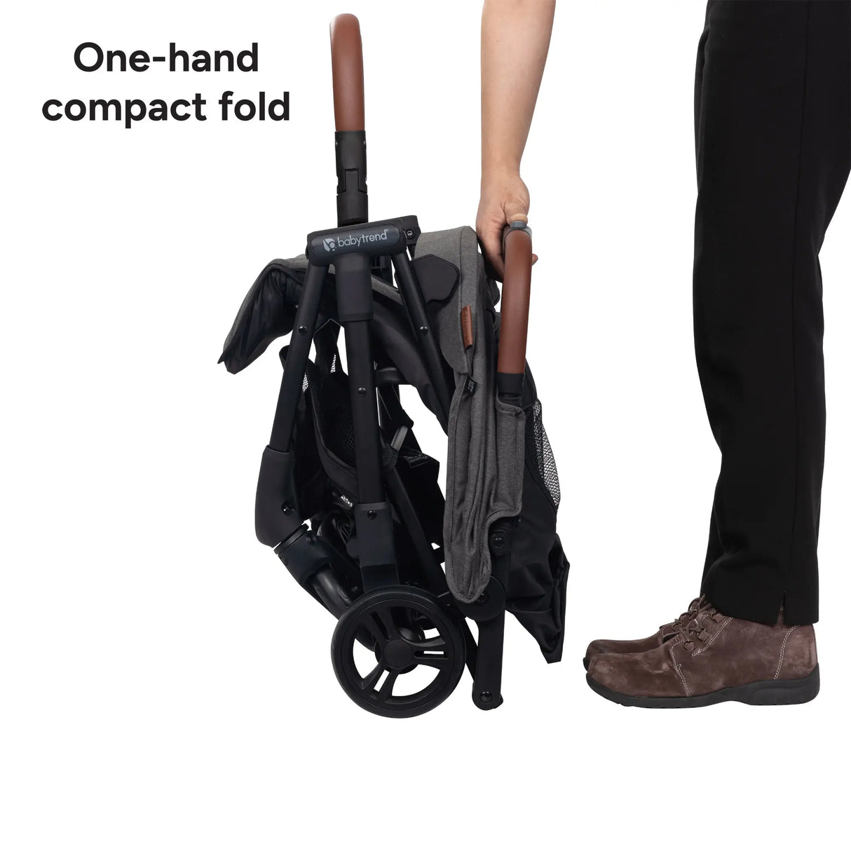 A hand is using the one hand compact fold of the Baby Trend Sonar Compact Lightweight Stroller