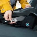 Load image into gallery viewer, A mom is installing the Baby Trend EZ-Lift PLUS Infant Car Seat base with LATCH