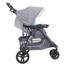 Load image into gallery viewer, Side view of the Baby Trend Skyline 35 Stroller Travel System with child seat recline