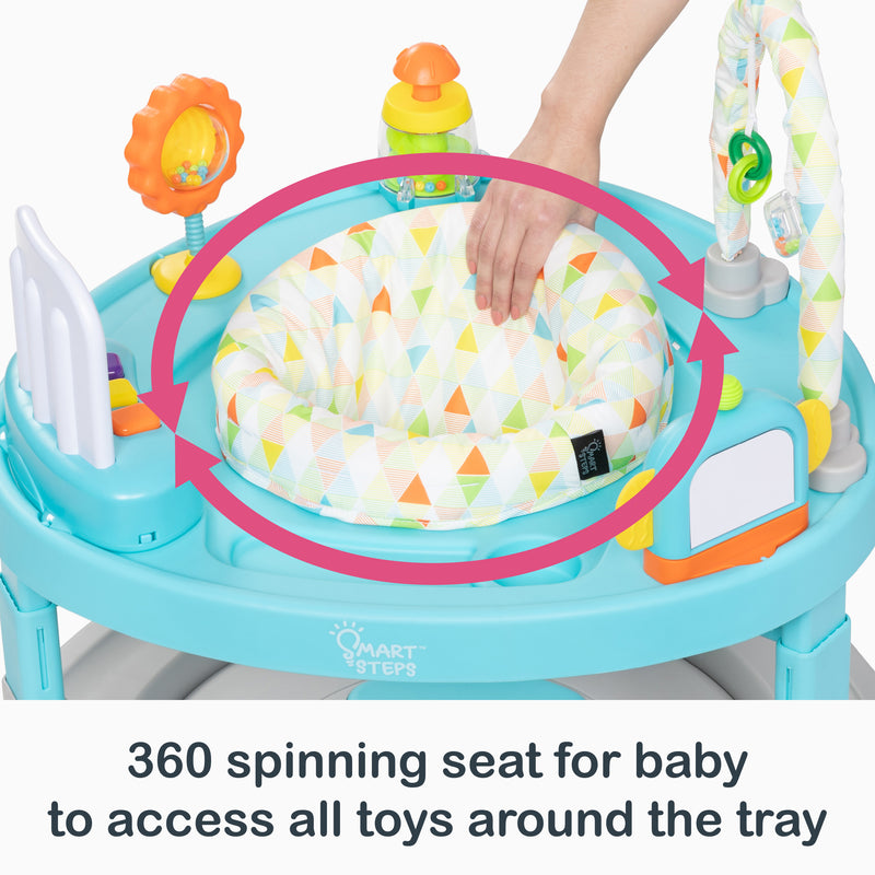 360 spinning seat for baby to access all toys around the tray of the Smart Steps Bounce N’ Dance 4-in-1 Activity Center Walker