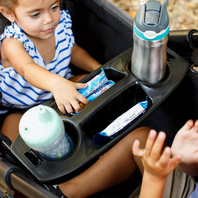 Baby Trend Expedition 2-in-1 Stroller Wagon comes with center console for children cups and snacks