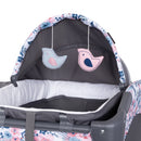 Load image into gallery viewer, Two hanging toys included on the napper from the Baby Trend Lil' Snooze Deluxe II Nursery Center Playard