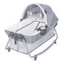 Load image into gallery viewer, Baby Trend Lil’ Snooze Deluxe III Nursery Center Playard with removable rocking bassinet