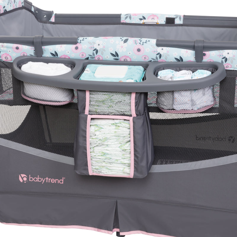 Baby Trend nursery center playard comes with a deluxe parent organizer for diapers and storage