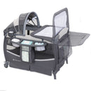 Load image into gallery viewer, Flip away changing table included with the Baby Trend Deluxe II Nursery Center Playard