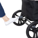 Load image into gallery viewer, Brake on wheel of the Baby Trend Expedition 2-in-1 Stroller Wagon PLUS