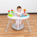 Load image into gallery viewer, A girl baby playing and sitting on the Baby Trend 3-in-1 Bounce N Play Activity Center