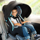 Load image into gallery viewer, Toddler boy sitting in the Baby Trend Cover Me 4-in-1 Convertible Car Seat