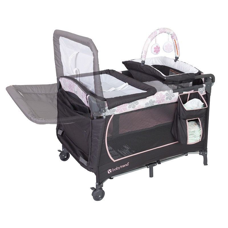 Flip away changing table comes with the Baby Trend Lil Snooze Deluxe Nursery Center Playard