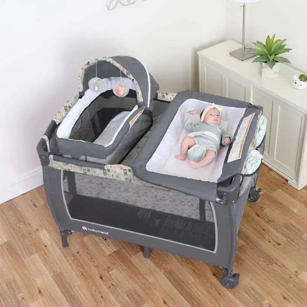 Baby laying in Baby Trend Playard