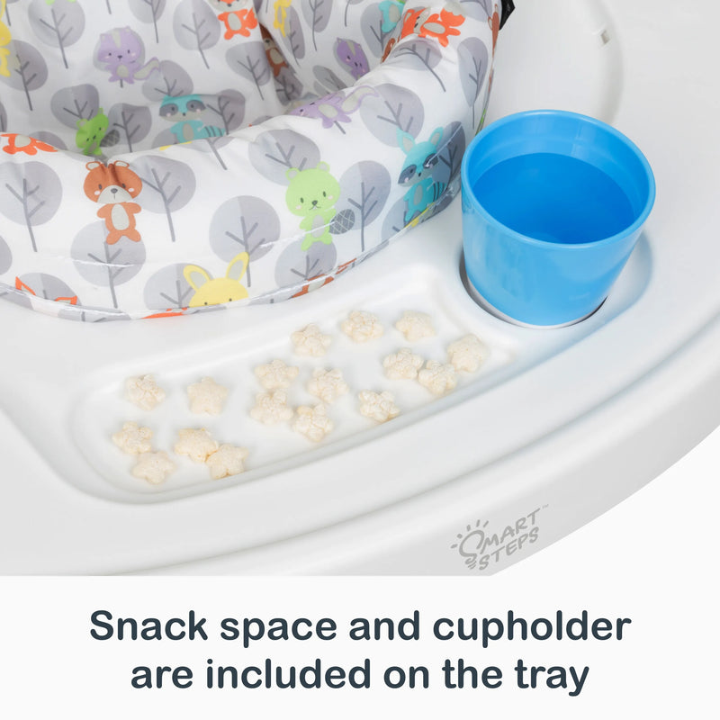 Snack Space and cup holder are included on the tray of the Smart Steps By Baby Trend Bounce N’ Play 3-in-1 Activity Center