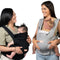 Two moms with their children using the Caleo 3-in-1 Newborn Carrier