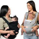 Load image into gallery viewer, Parents carrying their child with the Baby Trend Caleo Charm Deluxe 3-in-1 Newborn Carrier