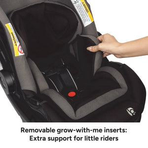 Car seat with a hand adjusting a removable grow-with-me insert, emphasizing extra support for young children.