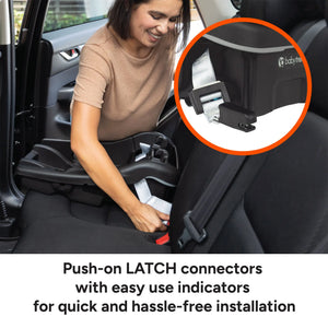 Woman installing a car seat with push-on LATCH connectors, emphasizing ease of use for the Baby Trend Secure-Lift Infant Car Seat 