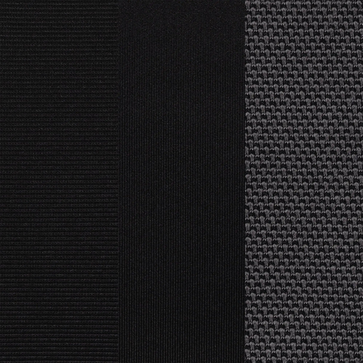 Close-up of black and gray textured fabric swatches from Baby Trend Secure-Lift Infant Car Seat 