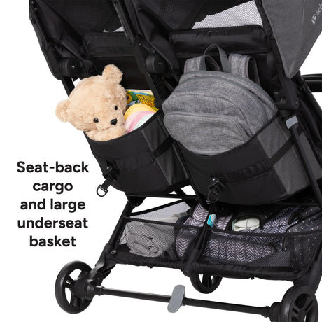Baby Trend York Compact Side-By-Side Double Stroller with seat-back cargo and large underseat basket, featuring a teddy bear and backpack.