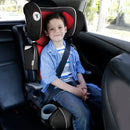 Load image into gallery viewer, A young child sitting in the Baby Trend PROtect 2-in-1 Folding Booster Car Seat 