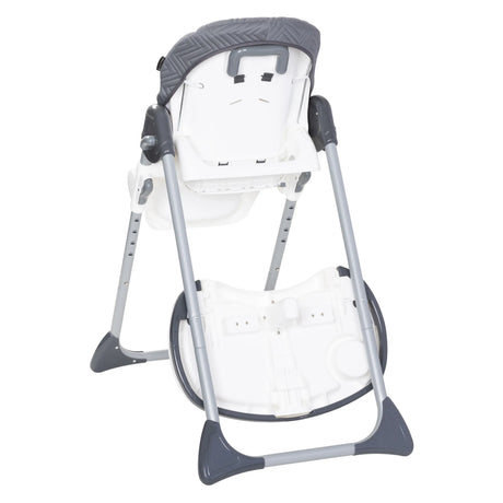 Back view of the Baby Trend Tot Spot 3-in-1 High Chair with the tray in storage