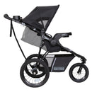 Load image into gallery viewer, Side view of the child seat recline of the Baby Trend Expedition DLX Jogger Stroller