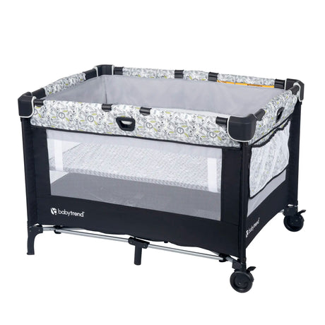 Baby Trend Nursery Den Playard with full-size bassinet attached