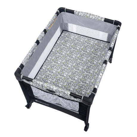 Top view of the Baby Trend Nursery Den Playard with removable full-size bassinet