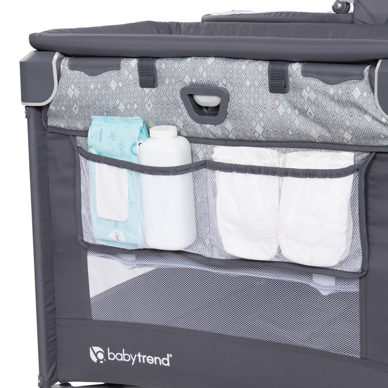 Baby Trend Nursery Den Playard with side diaper storage organizer