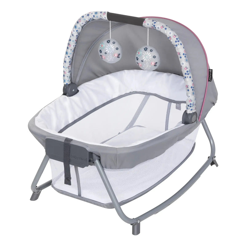 Baby Trend Nursery Den Playard with Rocking Cradle is portable