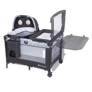 Baby Trend Nursery Den Playard with Rocking Cradle has a flip away changing table