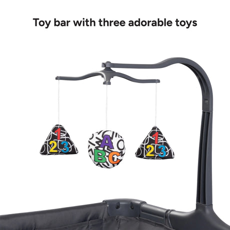 Baby Trend Sol Nursery Center Playard toy bar with three toys