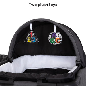 Baby Trend Willow Nursery Center Playard two plush toys on the napper