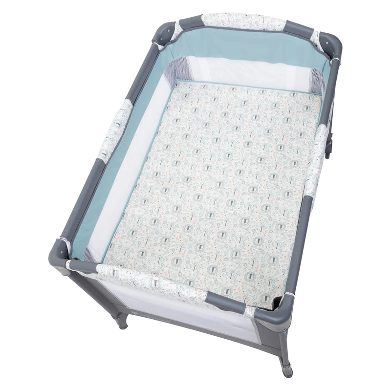 Top view of the floorboard on the Baby Trend EZ Rest Deluxe Nursery Center Playard