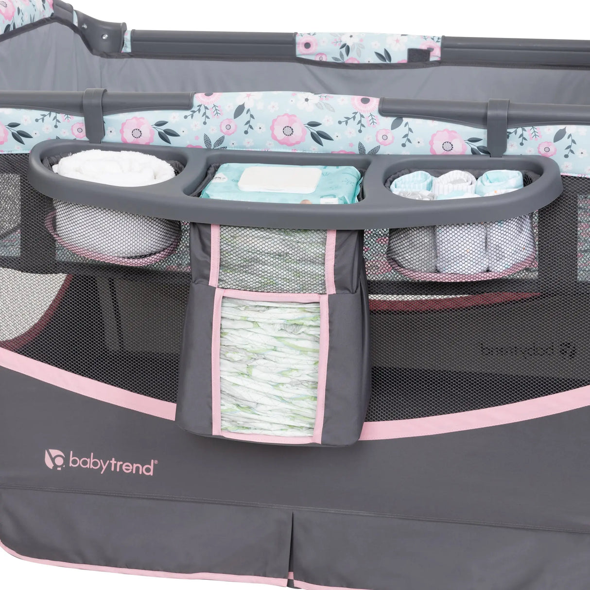 The parents diapers organizer on the side of the Baby Trend Deluxe II Nursery Center Playard