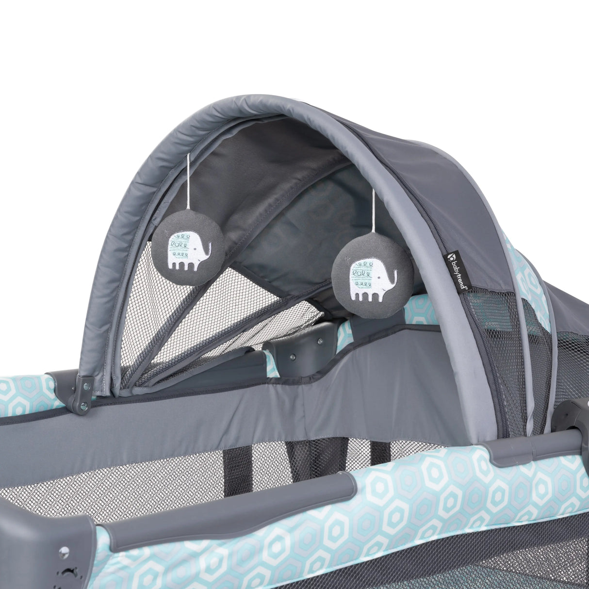 Canopy with two hanging toys on the Baby Trend EZ Rest Deluxe Nursery Center