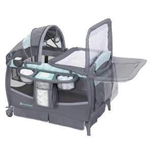 The changing table can flip away on the Baby Trend EZ Rest Deluxe Nursery Center