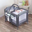 Load image into gallery viewer, A child laying on the changing table of the Baby Trend EZ Rest Deluxe Nursery Center Playard