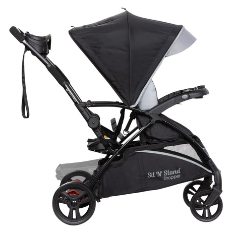 Side view of the Baby Trend Sit N Stand 5-in-1 Shopper Stroller with the storage basket extended
