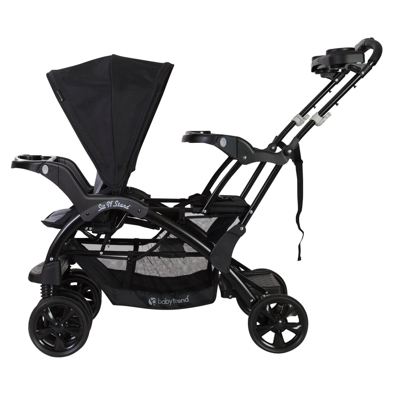 Baby Trend Sit N Stand Double Stroller with front child seat and rear stand on platform 