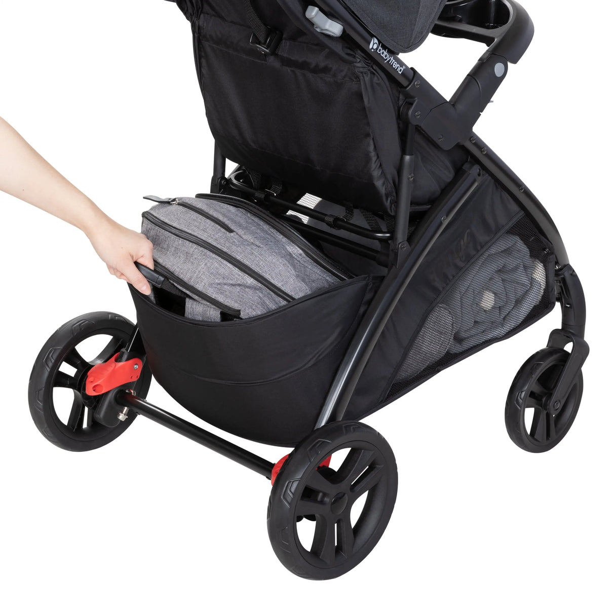 A person is accessing the basket from the rear of the Baby Trend Tango Stroller