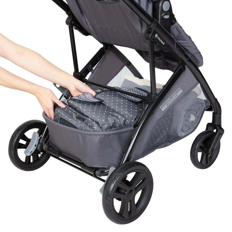 Large storage basket with rear access on the Baby Trend Passport Switch Modular Stroller