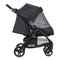 Side view with full netting cover of the Baby Trend Passport Carriage Stroller