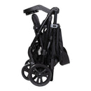 Load image into gallery viewer, Compact fold of the Baby Trend Passport Carriage Stroller