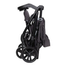 Load image into gallery viewer, Compact fold of the Baby Trend Passport Carriage Stroller