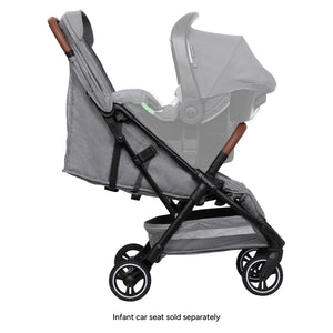 Side view of the Baby Trend Zenda Compact All-Terrain Stroller with a car seat attached