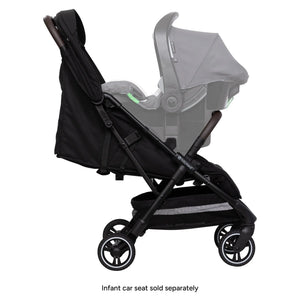 Side view of the Baby Trend Zenda Compact All-Terrain Stroller with a car seat attached