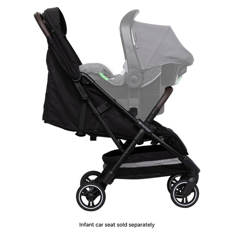 Side view of the Baby Trend Zenda Compact All-Terrain Stroller with a car seat attached